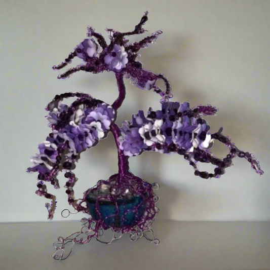 Purple wire tree with paper flowers and beads